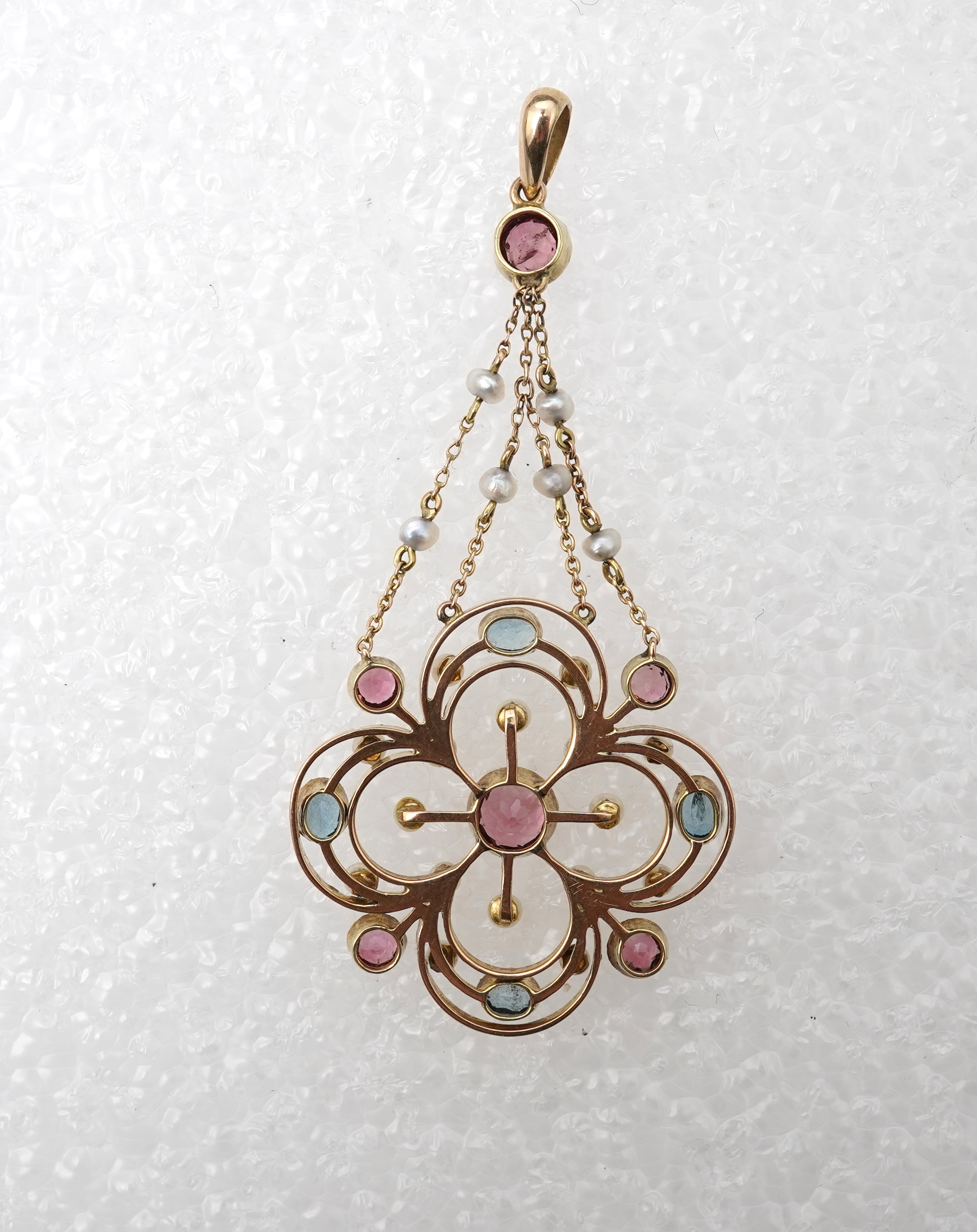 An attractive Edwardian tourmaline and seed pearl pendant, early 20th century
